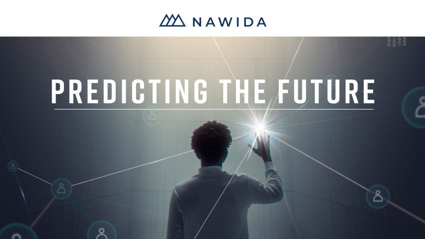 Ein Mann zeigt den Schriftzug "Predicting the Future"