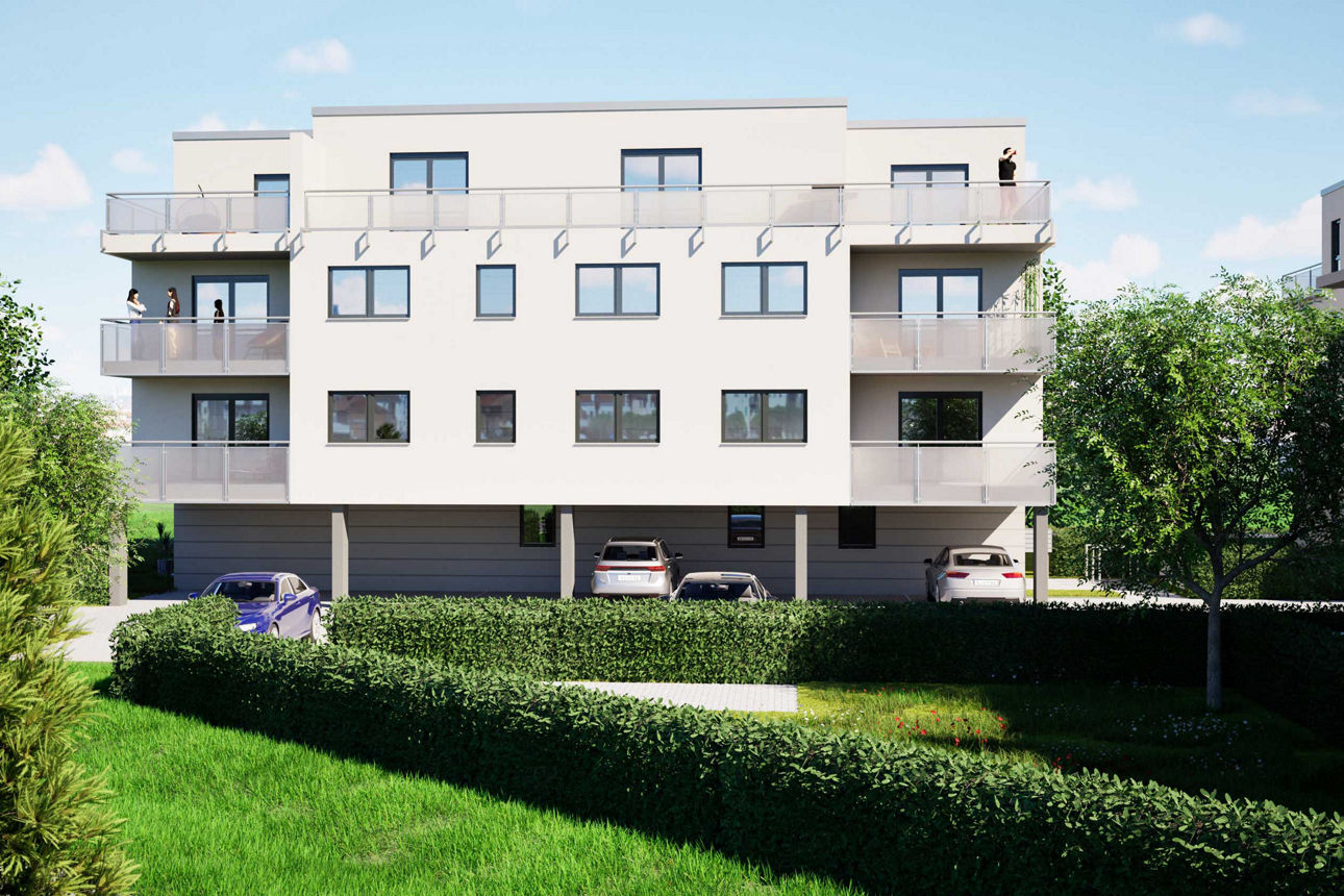 Mehrstöckiges Wohngebäude mit Balkonen und großen Fenstern, umgeben von einer gepflegten Grünfläche