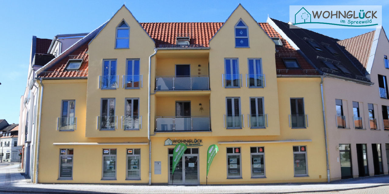 Mehrfamilienhaus mit Geschäfsträumen und dem Wohnglück der Spreewaldbank eG