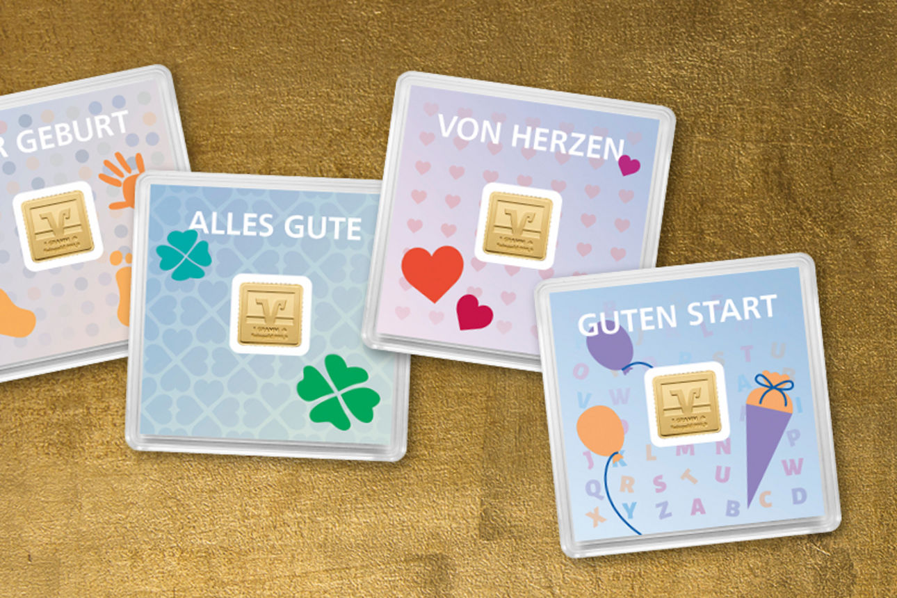 Verschiedene Goldstücke mit Volksbankprägung