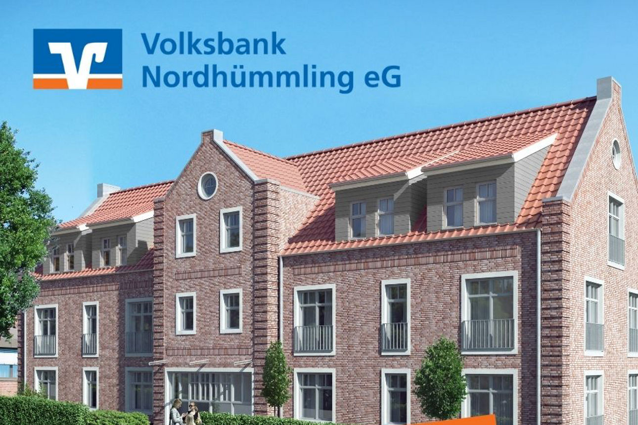 Das Bild zeigt ein charmantes Backsteingebäude, möglicherweise ein Reihenhaus oder einen Wohnkomplex. 