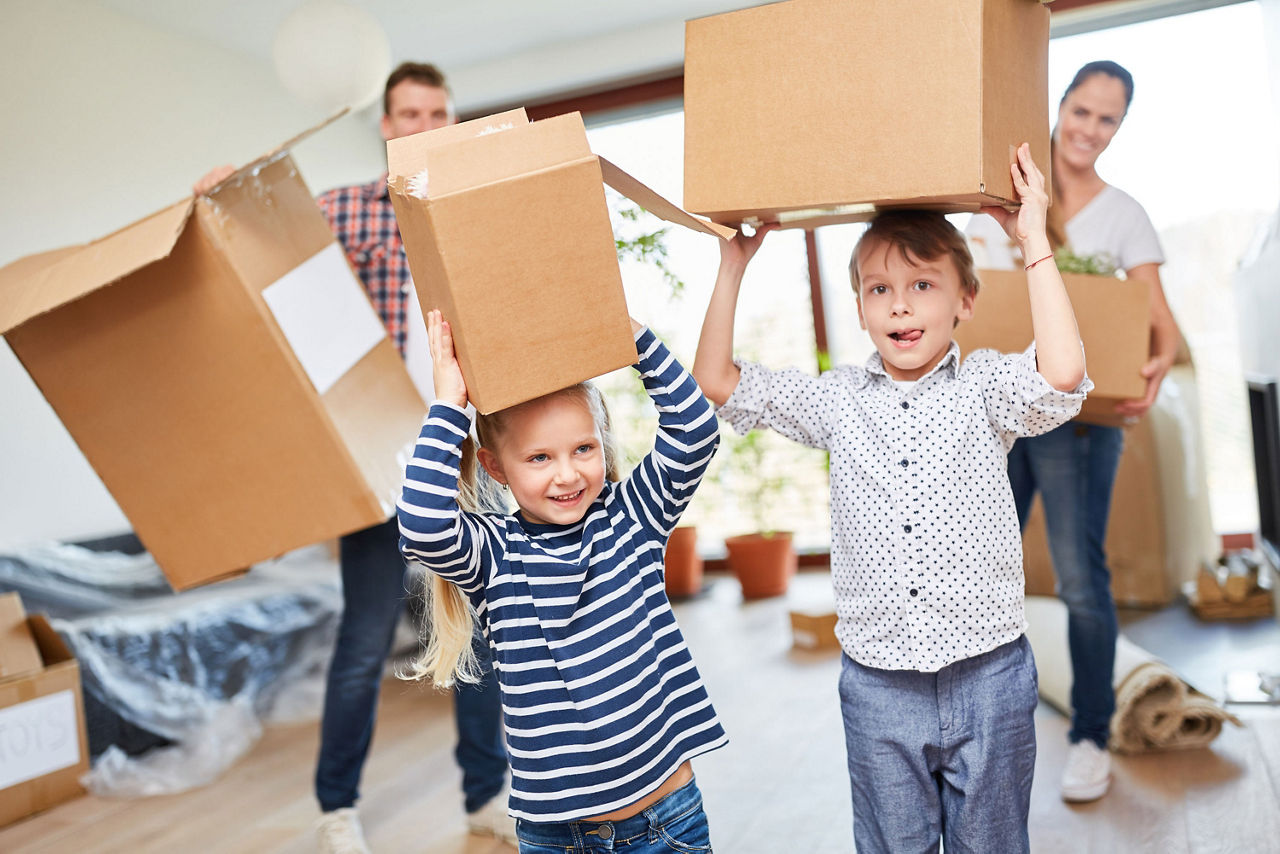 Loving mother hugs her little baby at home