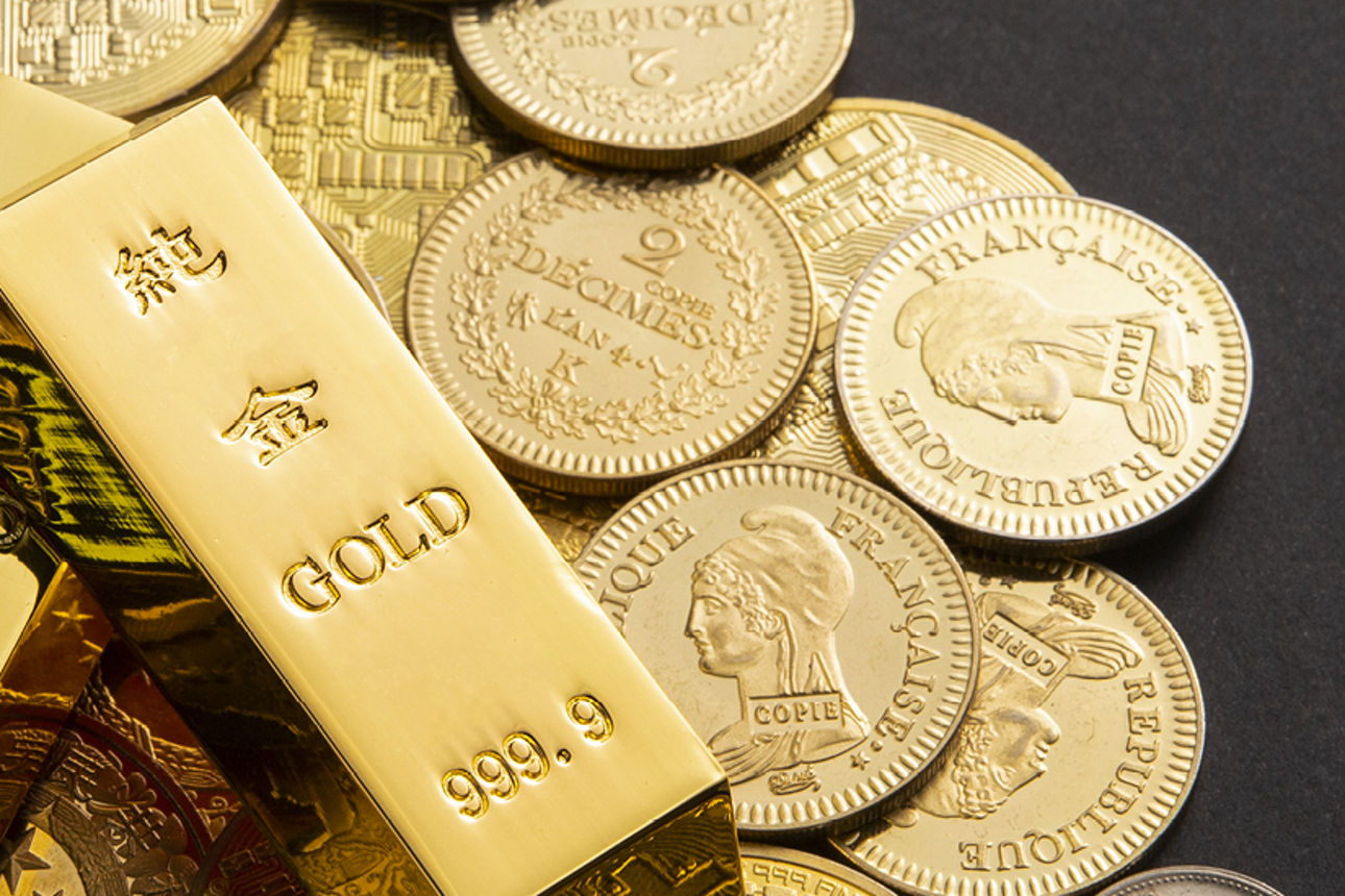 Goldbarren und Goldmünzen