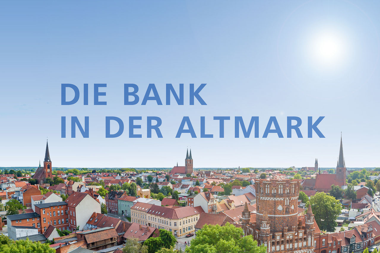 Vogelperspektive einer Stadt mit dem Spruchbanner "Die Bank in der Altmark"