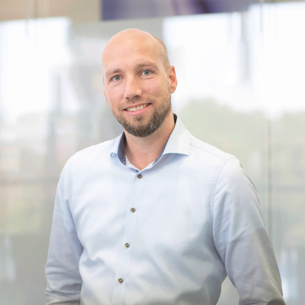 Portraitfoto von Nils Hüneke