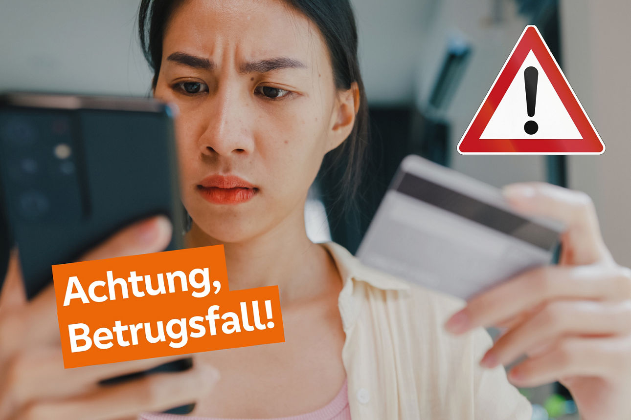 Frau mit Handy in der Hand - Text Achtung Betrugfall und Warndreieck