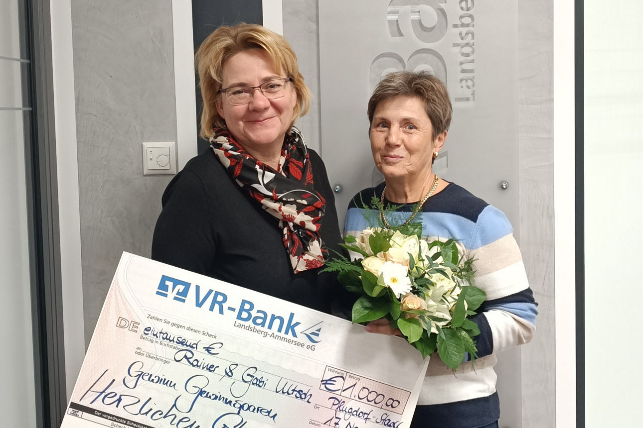 1.000 Euro und ein Blumenstrauß