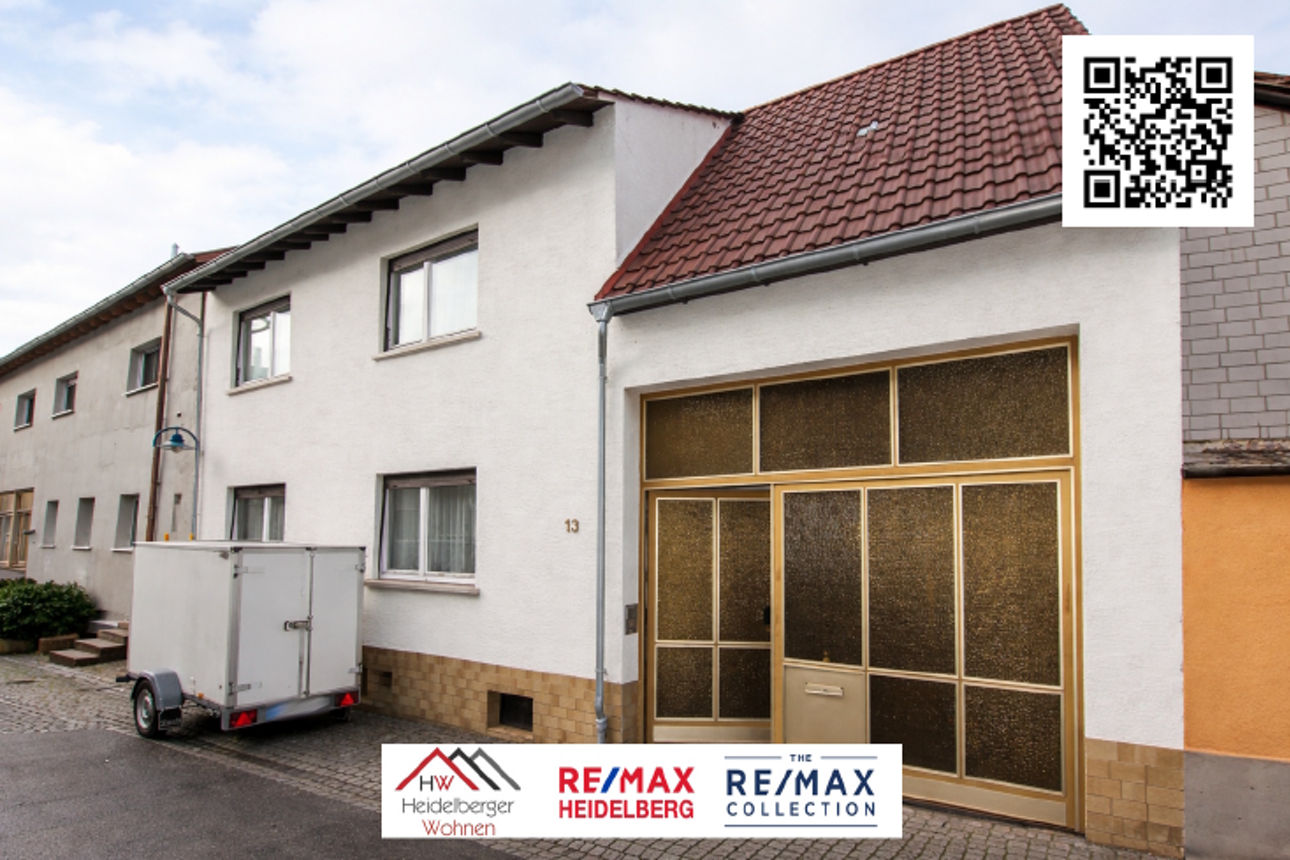 Haus mit überdachter Hofeinfahrt