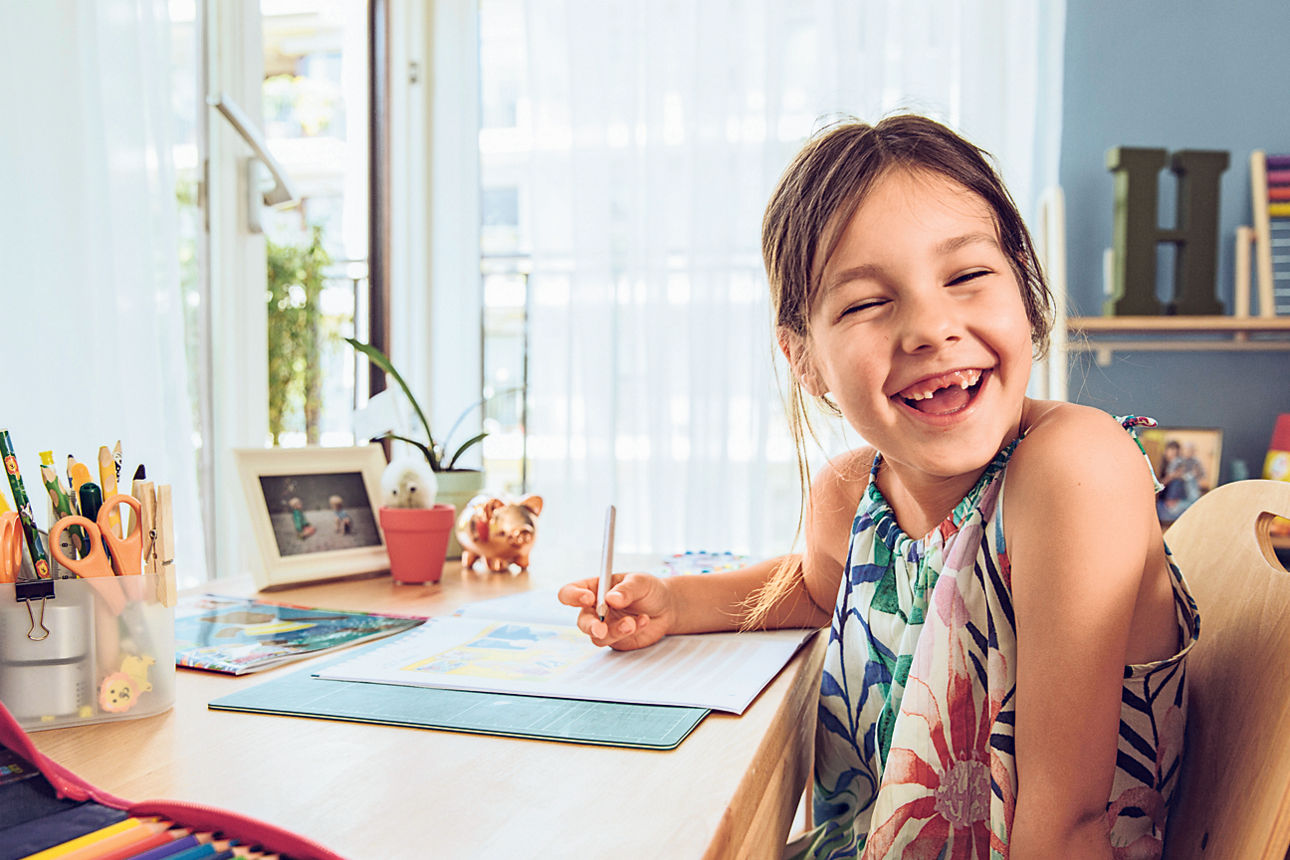 Girl doing her schoolwork at home, Cologne, NRW, Germany