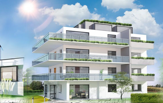 Ein modernes Mehrfamilienhaus, umgeben von üppigen Grünpflanzen