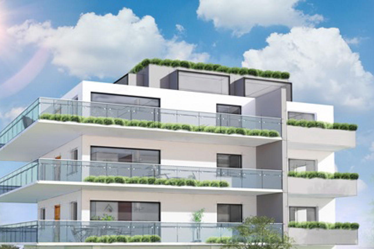 Ein modernes Mehrfamilienhaus, umgeben von üppigen Grünpflanzen