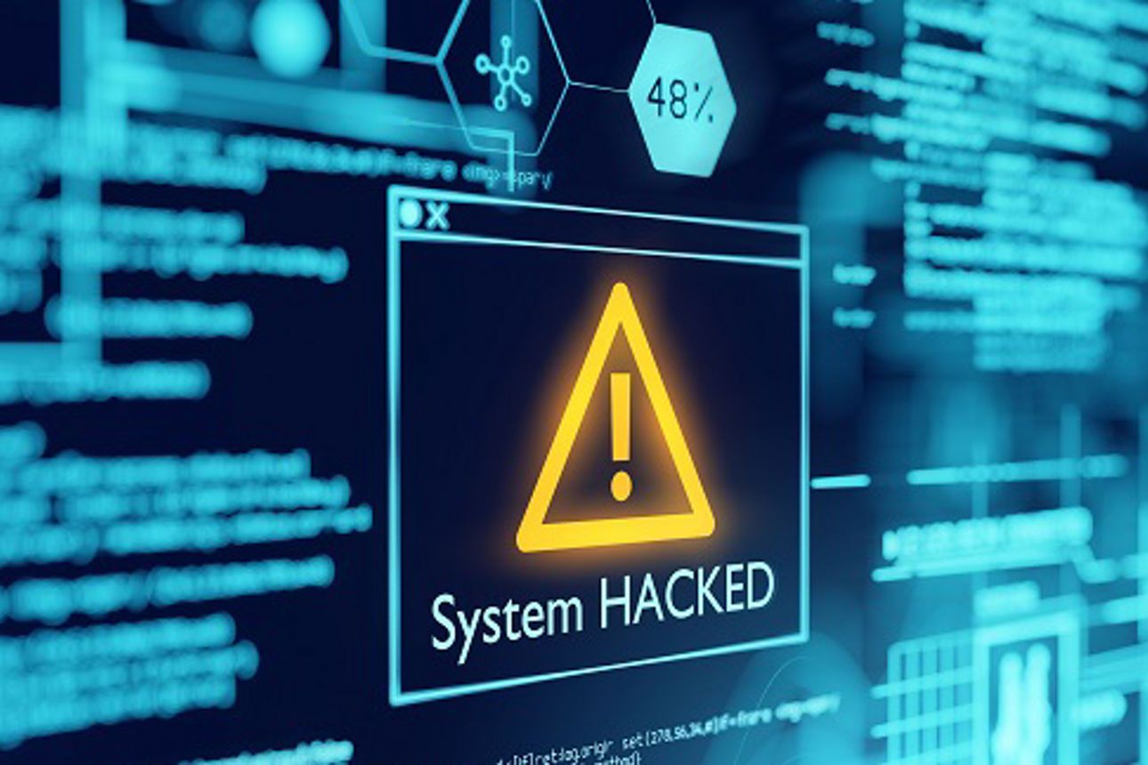 Das Bild eines Computers mit einem Warnzeichen auf dem Bildschirm