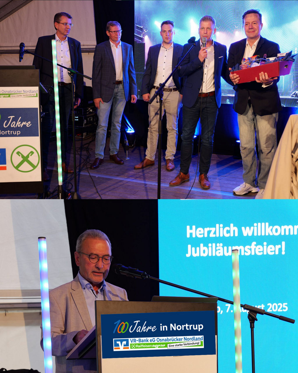 Ein vornehmer Herr spricht vor einem Publikum auf einem Podium, das von bunten Lichtern beleuchtet wird.