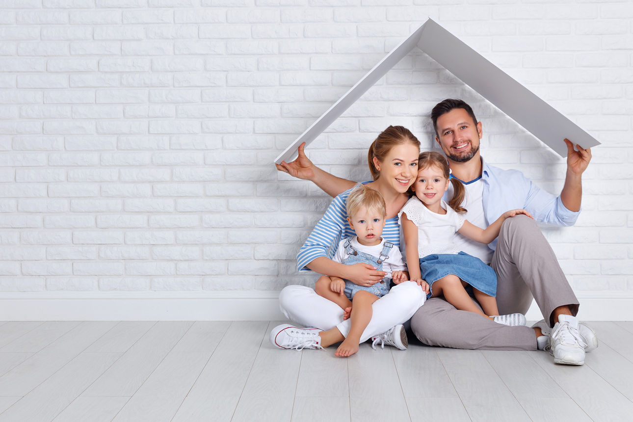 concept housing a young family. mother father and children in a new home