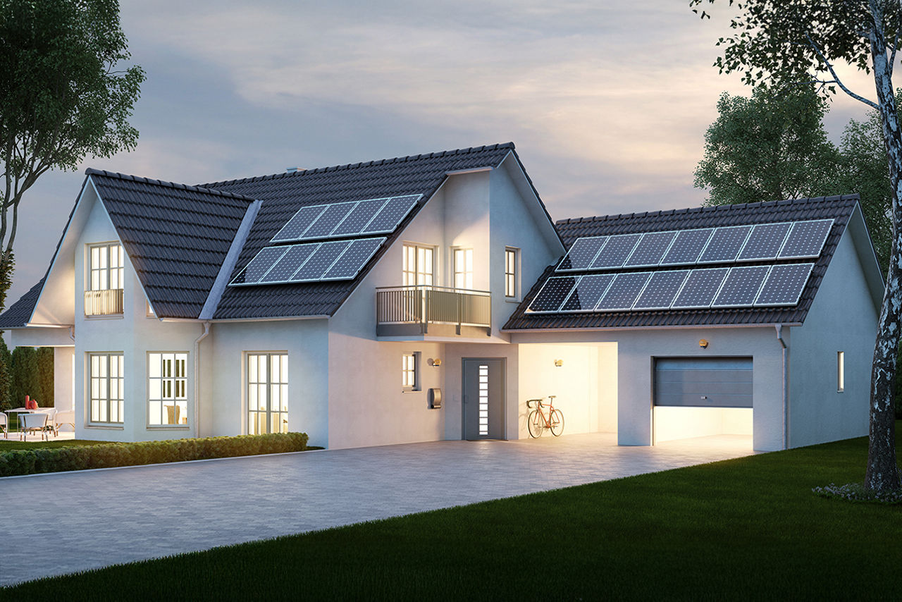 Einfamilienhaus mit Garage und Solarplatten auf dem Dach