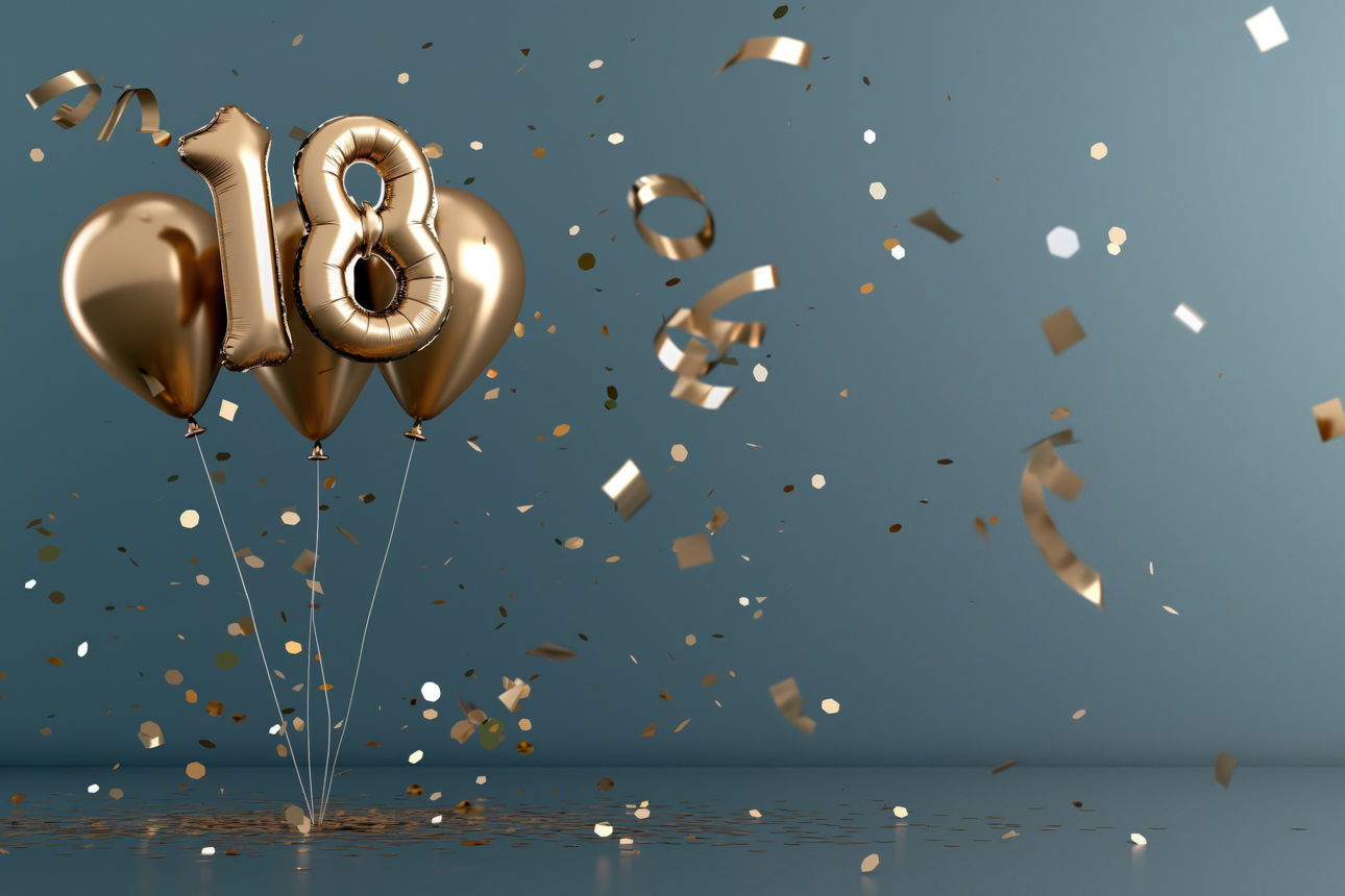Inflatable foiled golden balloons number 18 on gray background with confetti. 18 years anniversary celebration. Birthday party concept Goldene Luftballons mit einer 18