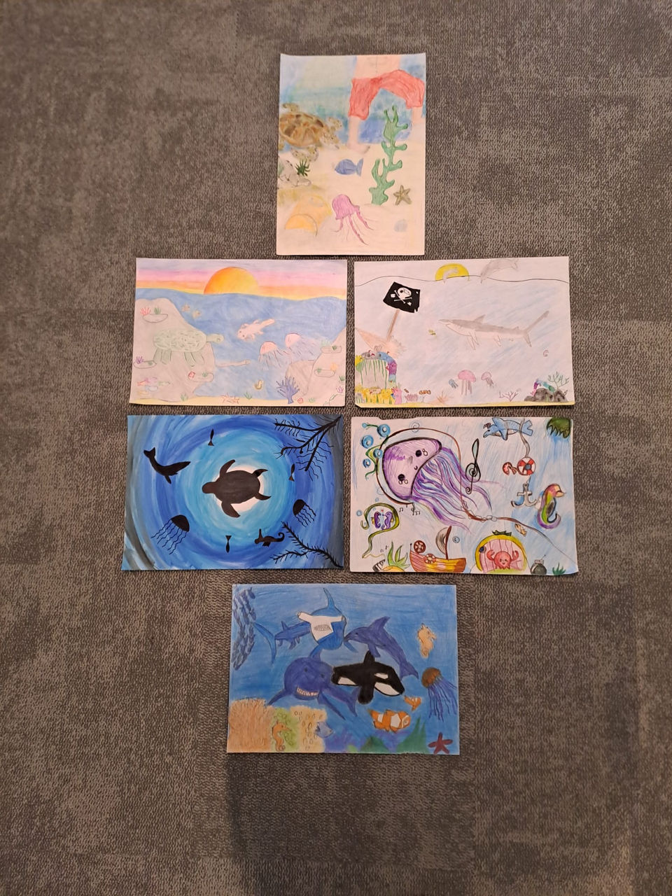 6 gemalte Bilder von Kindern der Klassen 3 und 4
