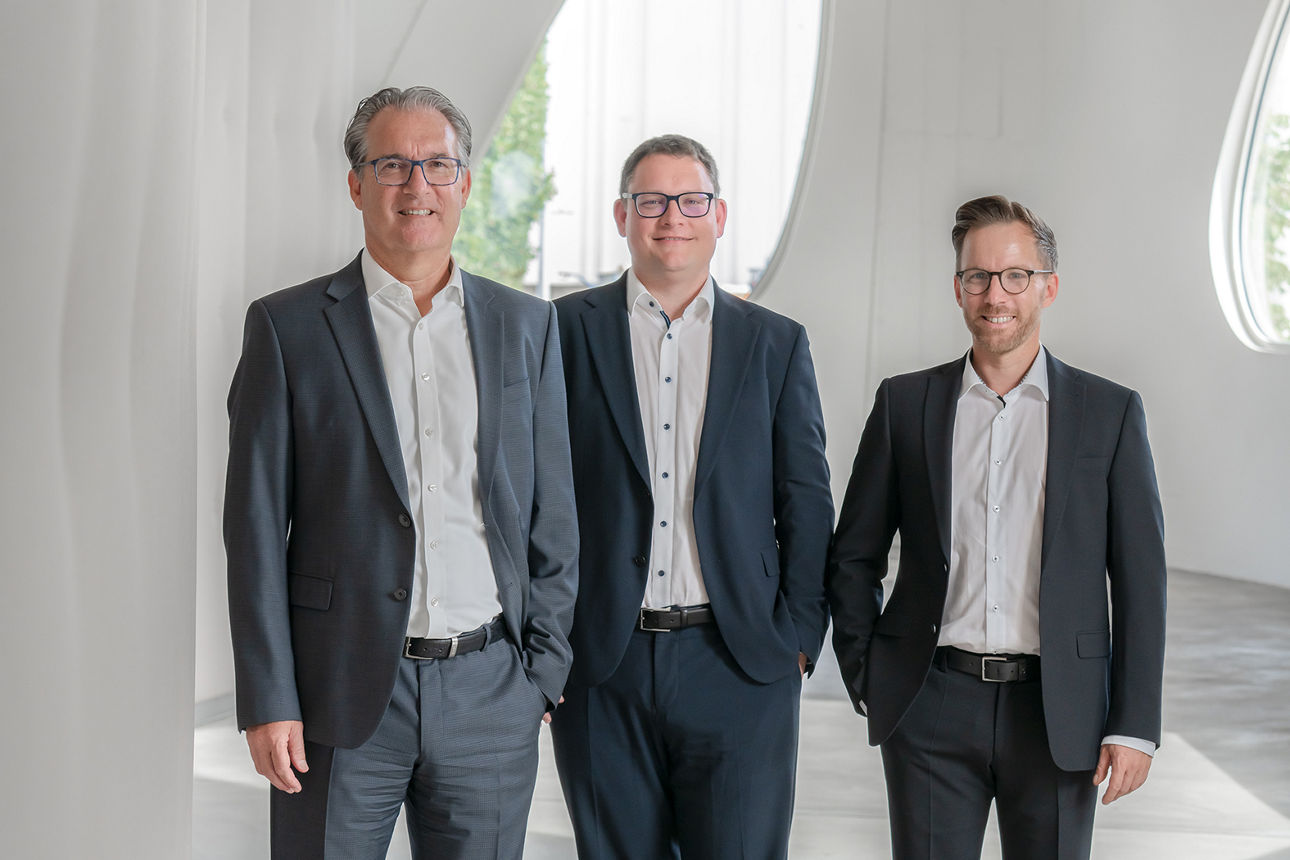 3 Herren des Vorstandes im Anzug