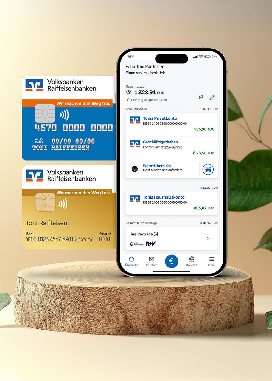 Smartphone mit der Banking App und Volksbank Girokarten