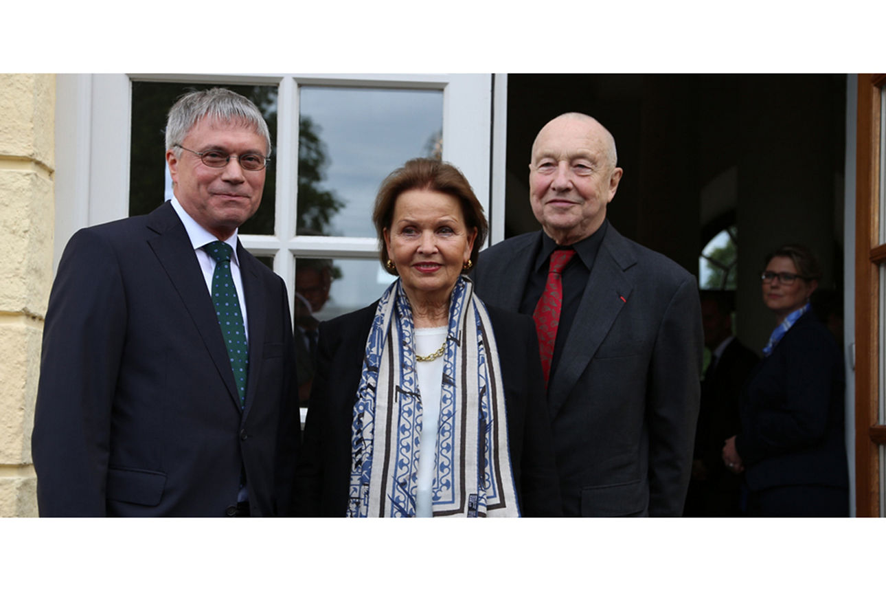 Zwei Männer und eine Frau im Portrait