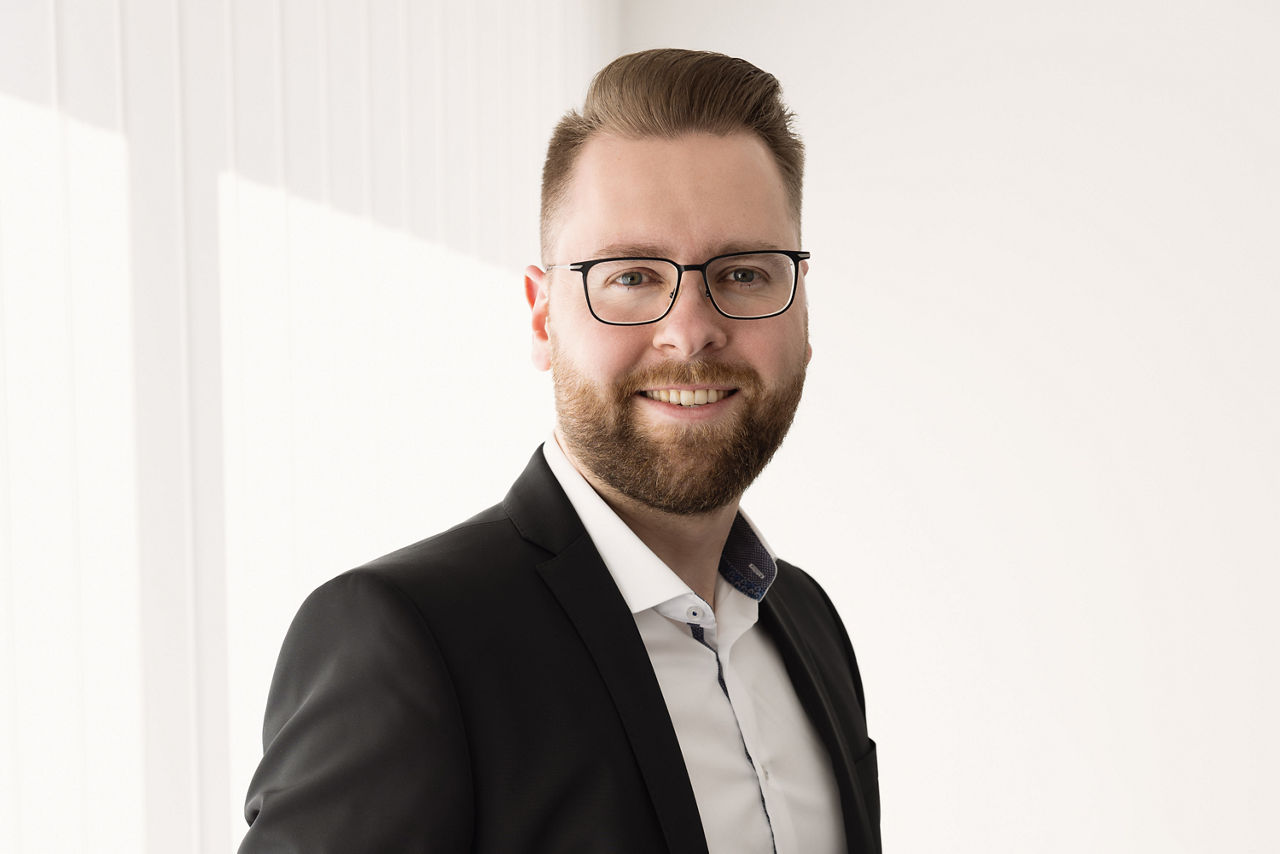 Porträtfoto von André Butzmühlen