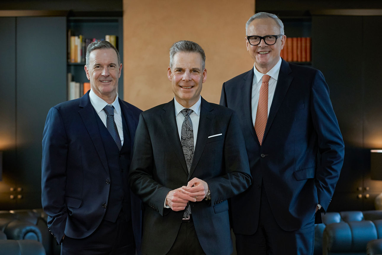 Drei Männer im Anzug: Team Werther und Ernst  