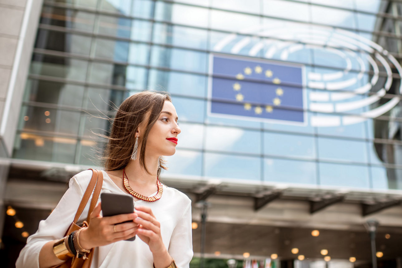 Businesswoman near the parliament building in Brussel
