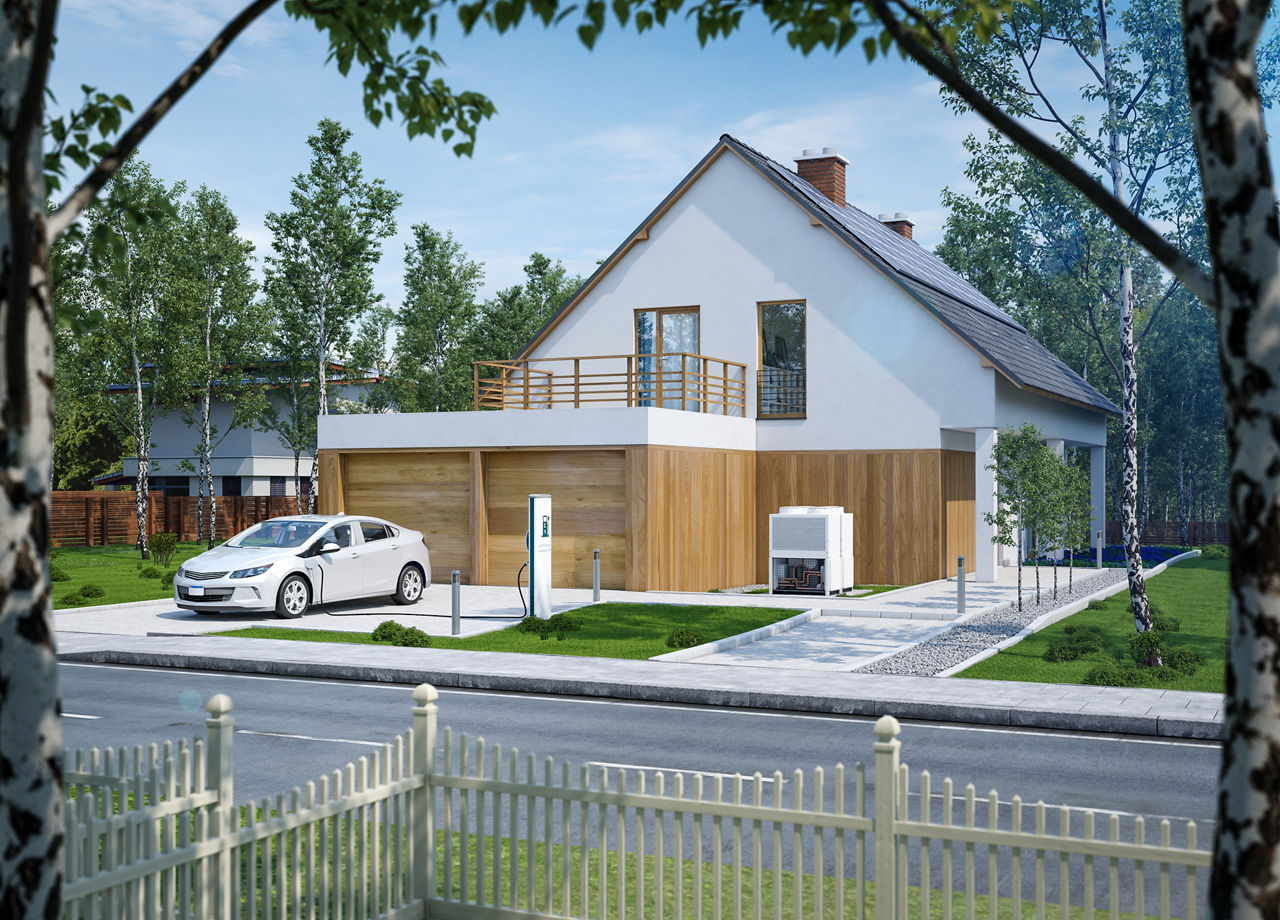 Modernes Haus mit E-Auto vor der Garage