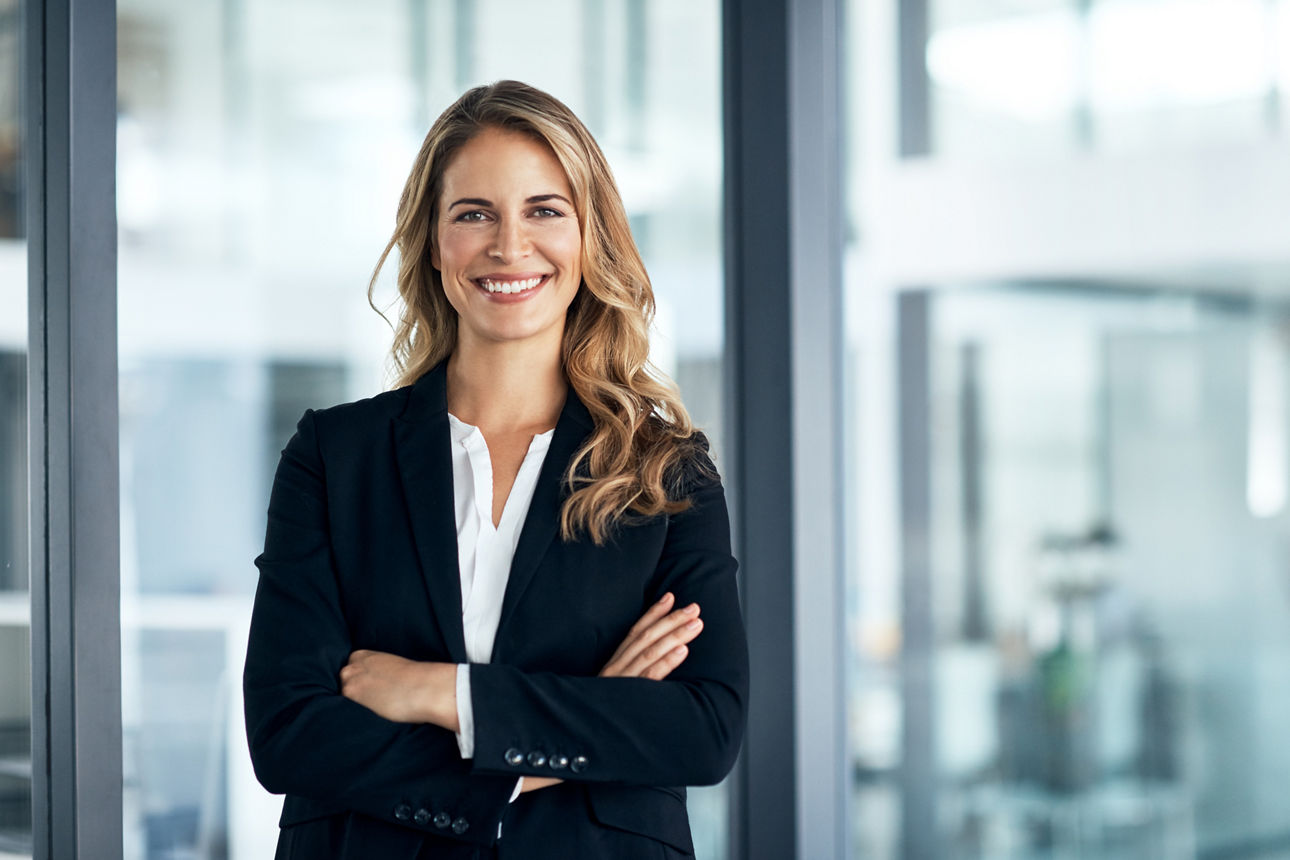 Shot of a confident young businesswoman standing in a modern office