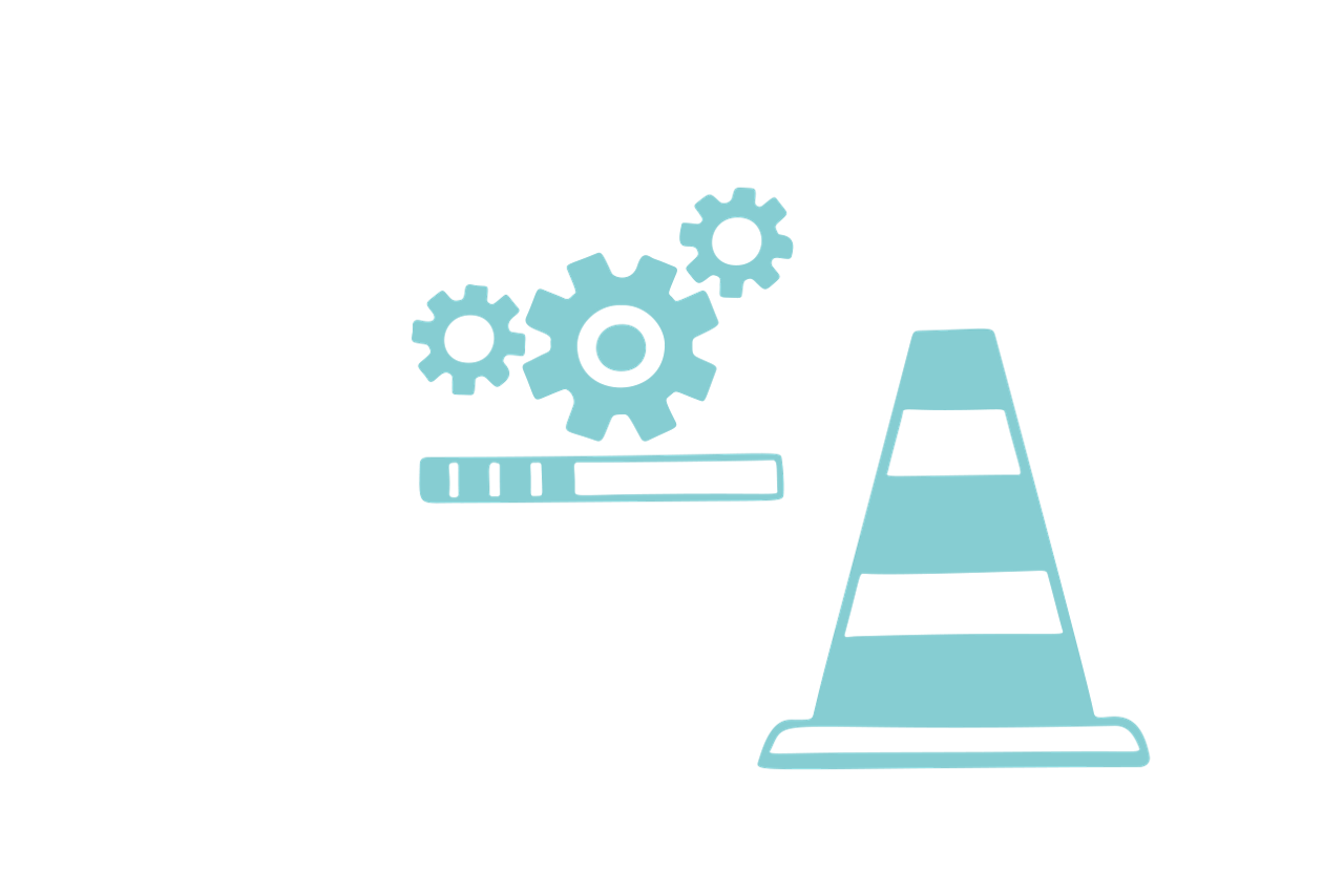 Laptop mit Zahnräder und einem Verkehrshütchen