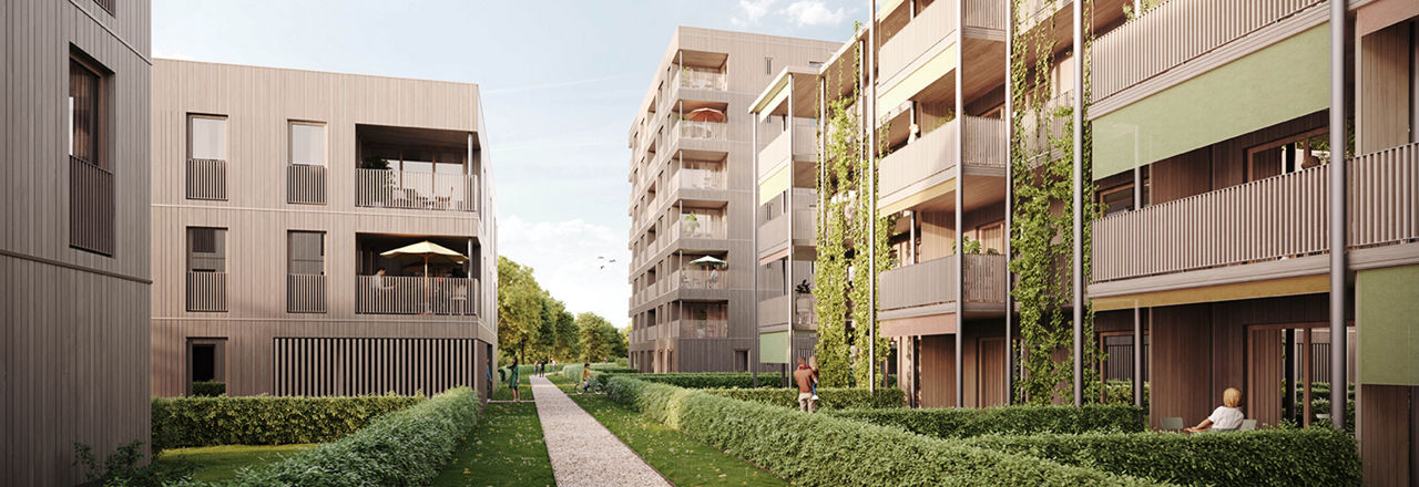 Modernes, nachhaltiges Wohnen in Wangen: Holzbauweise, viel Grün, große Balkone und ruhige, parkähnliche Umgebung.