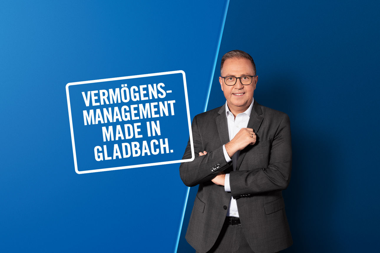 Bankmitarbeiter mit Spruch Vermögensmanagment made in Gladbach