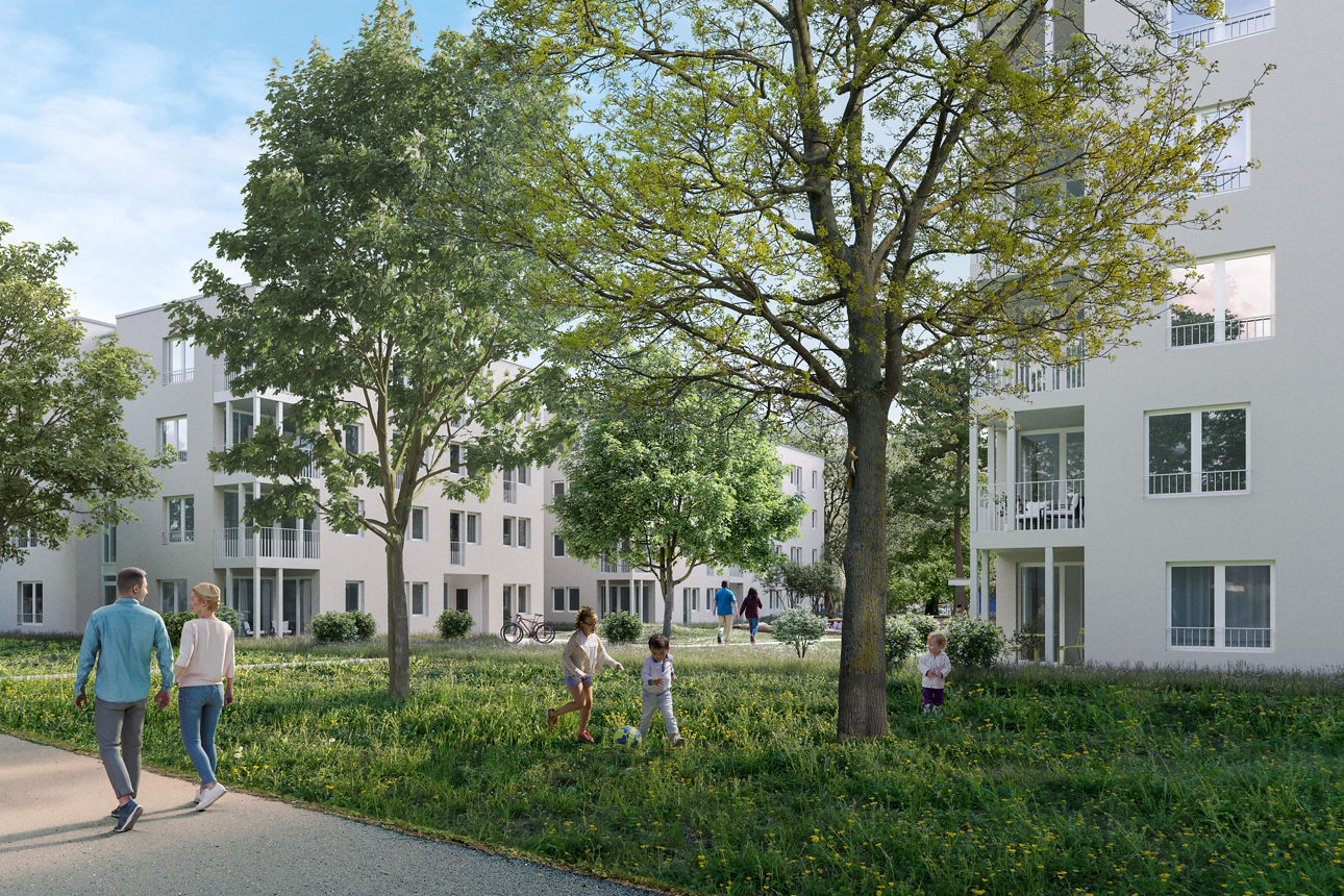 Grünfläche zwischen mehreren hellen Wohngebäuden, mit Bäumen, Wegen und mehreren Personen, die sich im Außenbereich bewegen.