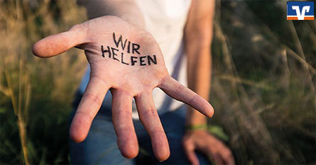Hand mit Spruch Wir helfen
