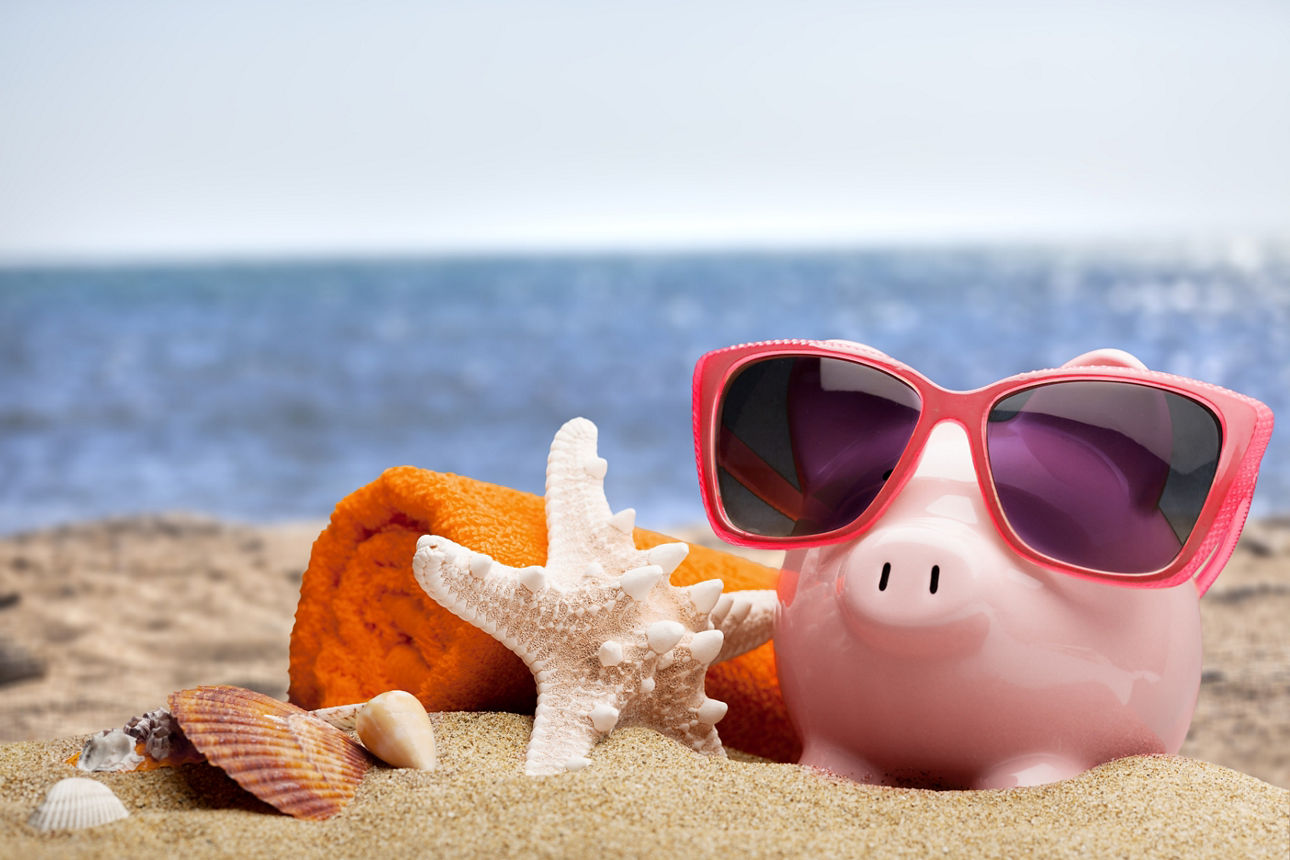 Summer piggy bank with sunglasses