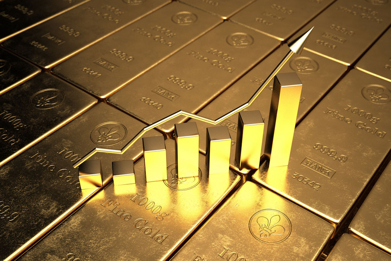 Goldbarren mit Chart, der nach oben zeigt