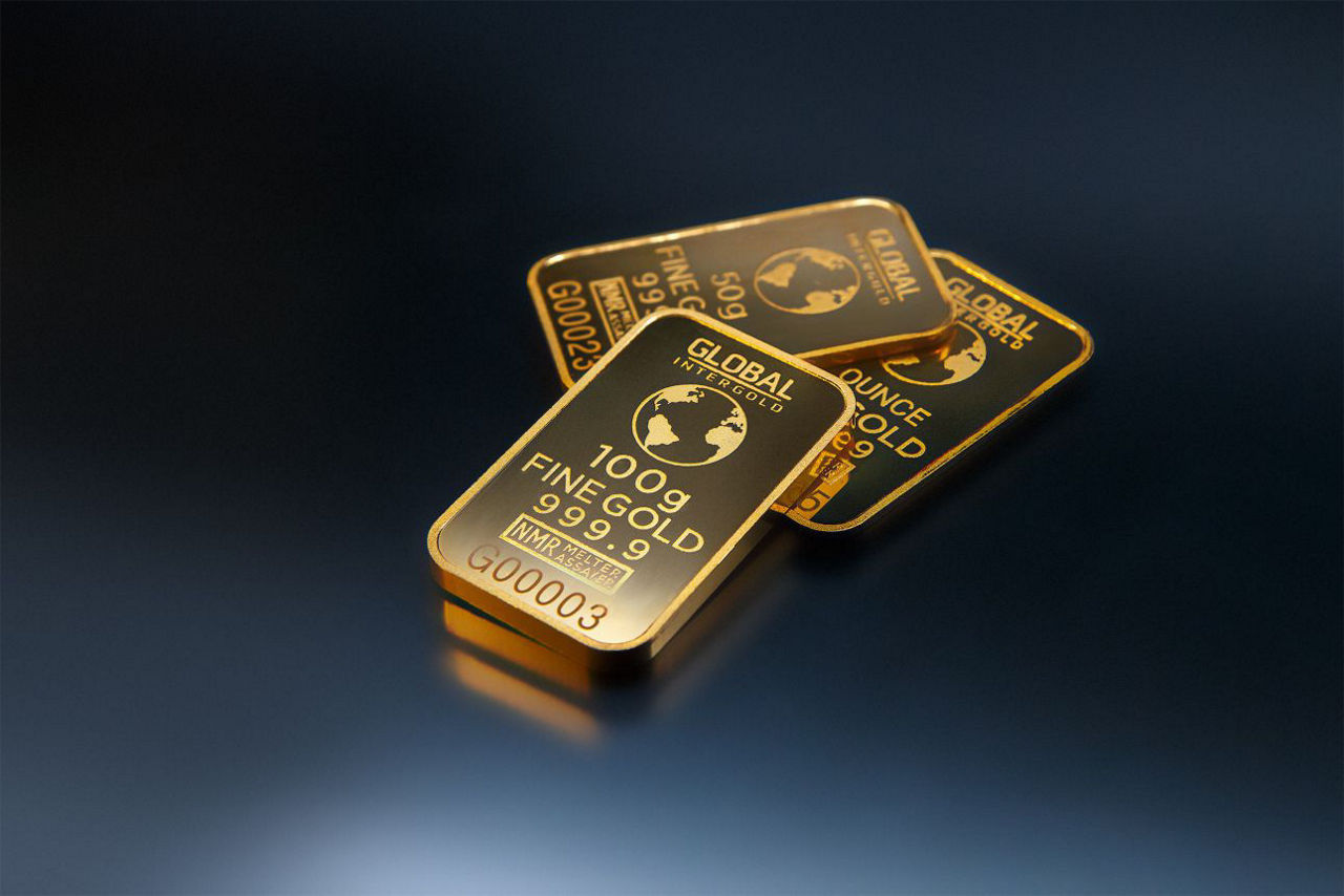Goldbarren auf schwarzem Grund