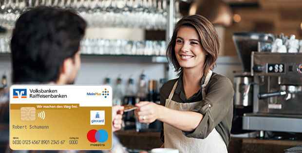 Barista richt Kunden goldene Girocard