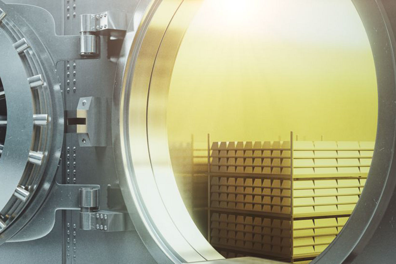 Sideview of an open bank vault with gold stacks. 3D Render