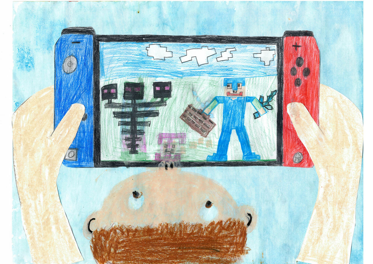 Kind mit Switch Console