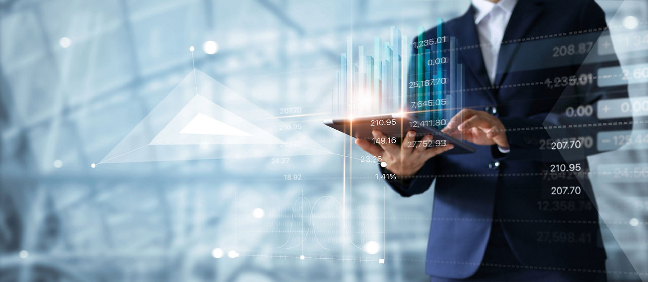 Businessman using tablet analyzing sales data and economic growth graph chart.  Business strategy. Abstract icon. Digital marketing.