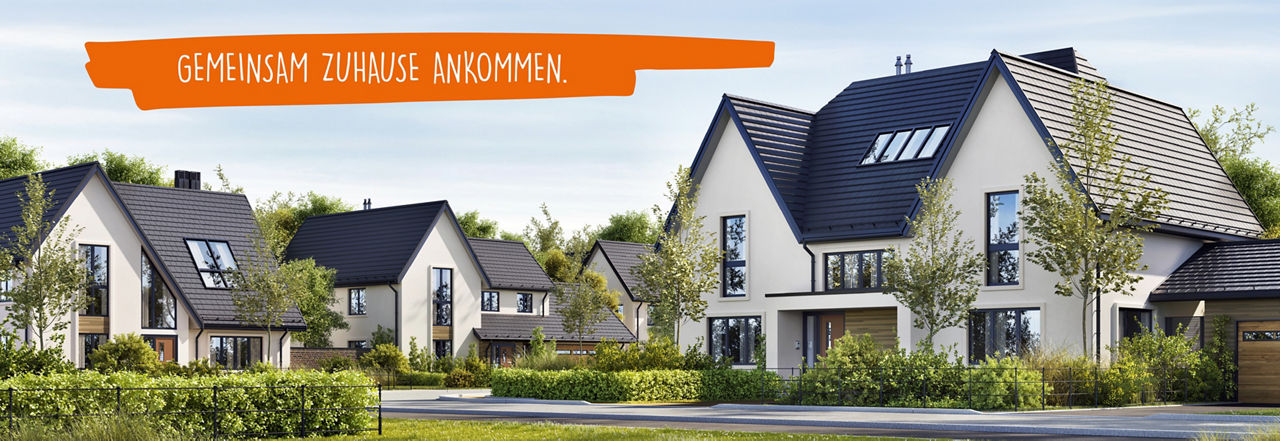 Mehrere moderne Einfamilienhäuser mit dem Slogan 'Gemeinsam Zuhause ankommen'