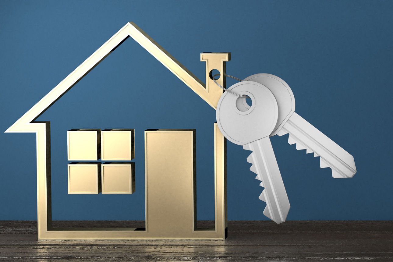 Stilisiertes goldenes Haus-Symbol mit zwei silbernen Schlüsseln