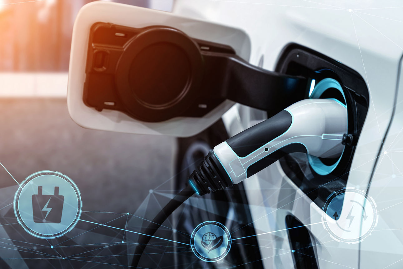 EV charging station for electric car in concept of alternative green energy produced from sustainable resources to supply to charger station in order to reduce CO2 emission .