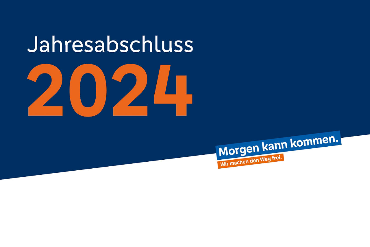 Schriftzug "Jahresabschluss 2024" auf einem blauen Hintergrund