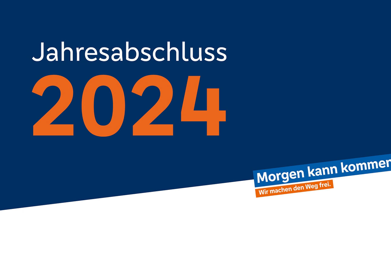 Schriftzug "Jahresabschluss 2024" auf einem blauen Hintergrund