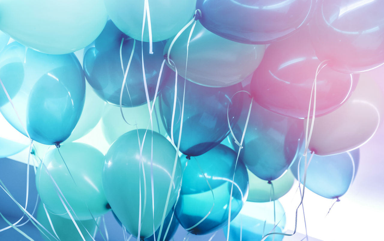 Party background, abstract festive background of a bunch of blue air balloons