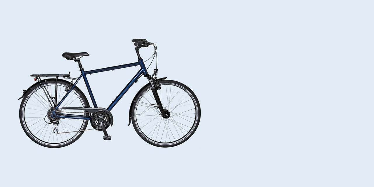 Fahrrad vor blauem Hintergrund