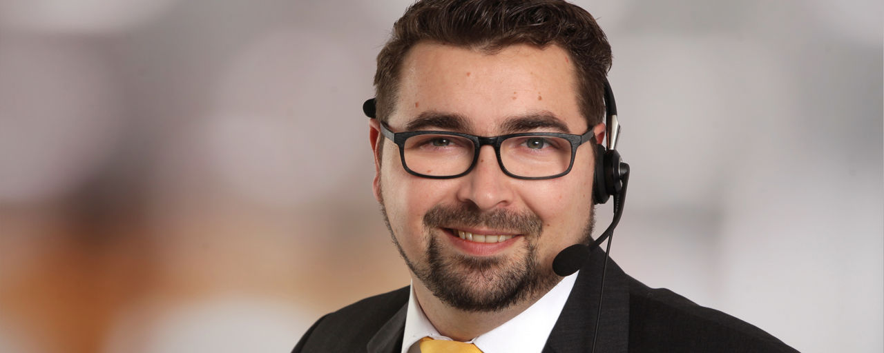 Mitarbeiter aus dem KSC mit Headset