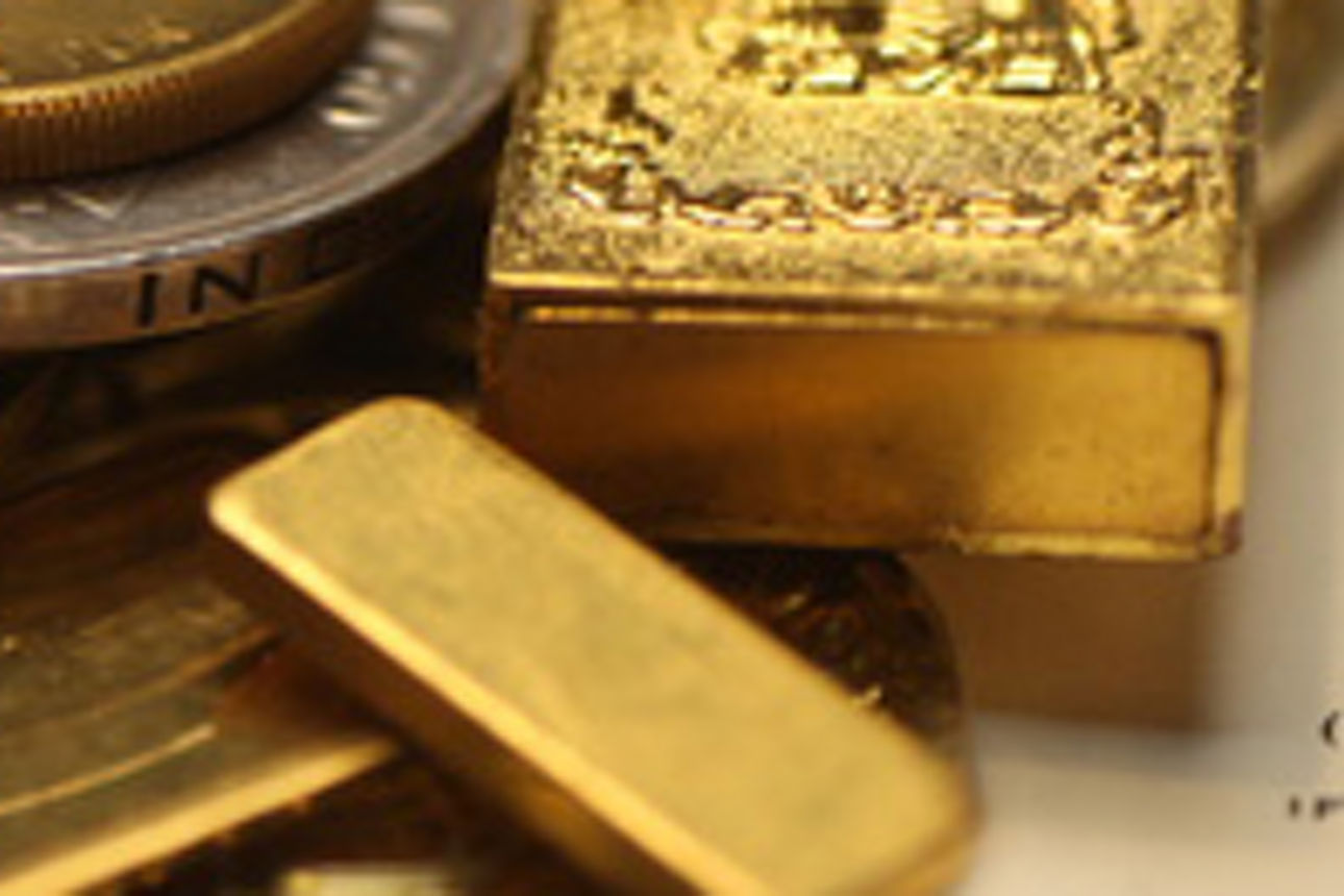 viele Goldmünzen und Barren